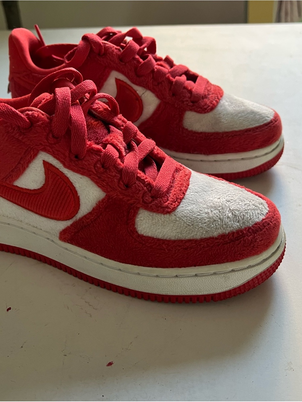 Nike Kids Red and White Low-Top Sneakers with fleece texture  Upper